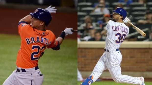 The Blue Jays missed out on Brantley (left), but can still land Conforto (right).